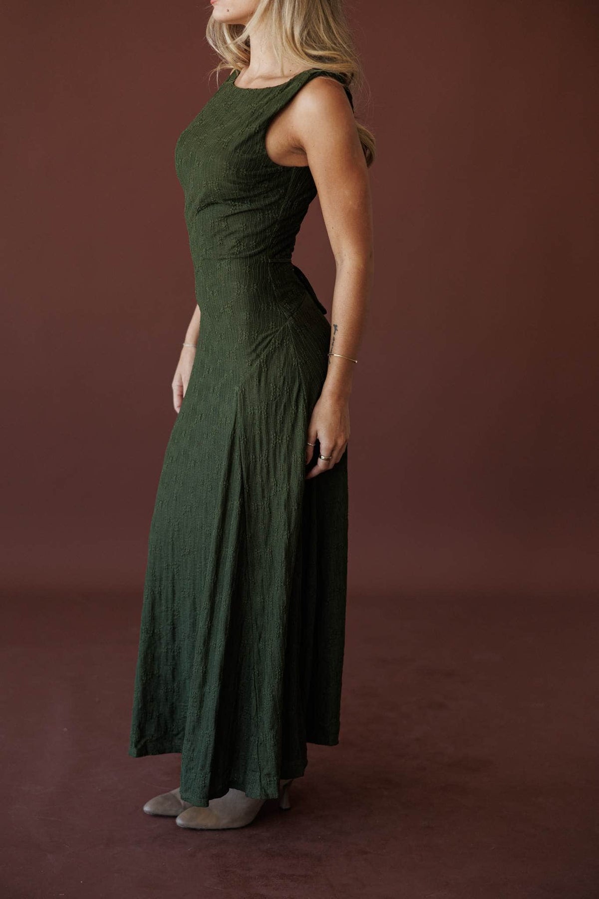 Evergreen Evening Maxi Dress, front view with the skirt in motion