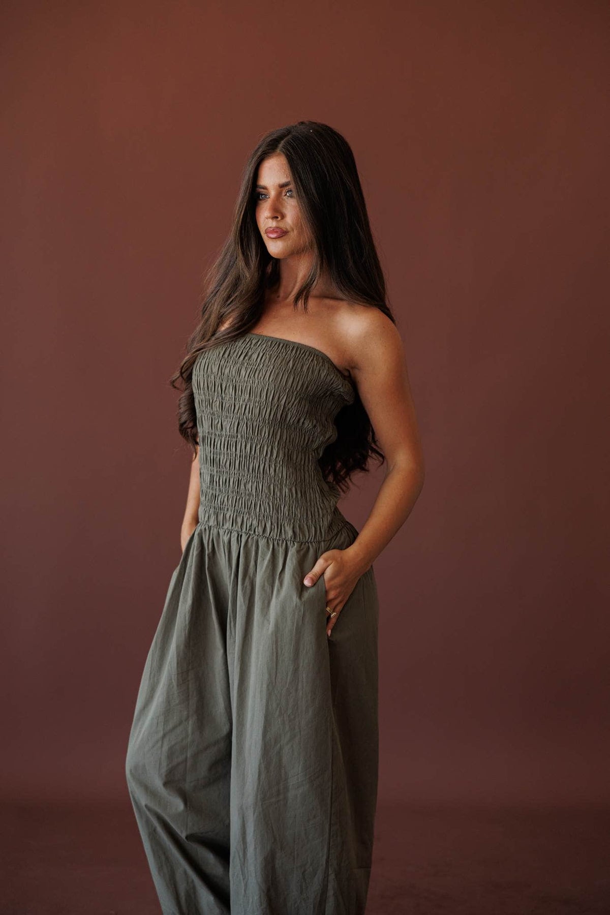 Evening Event Wide Leg Jumpsuit, in olive, three-quarter front view of the smocked bodice