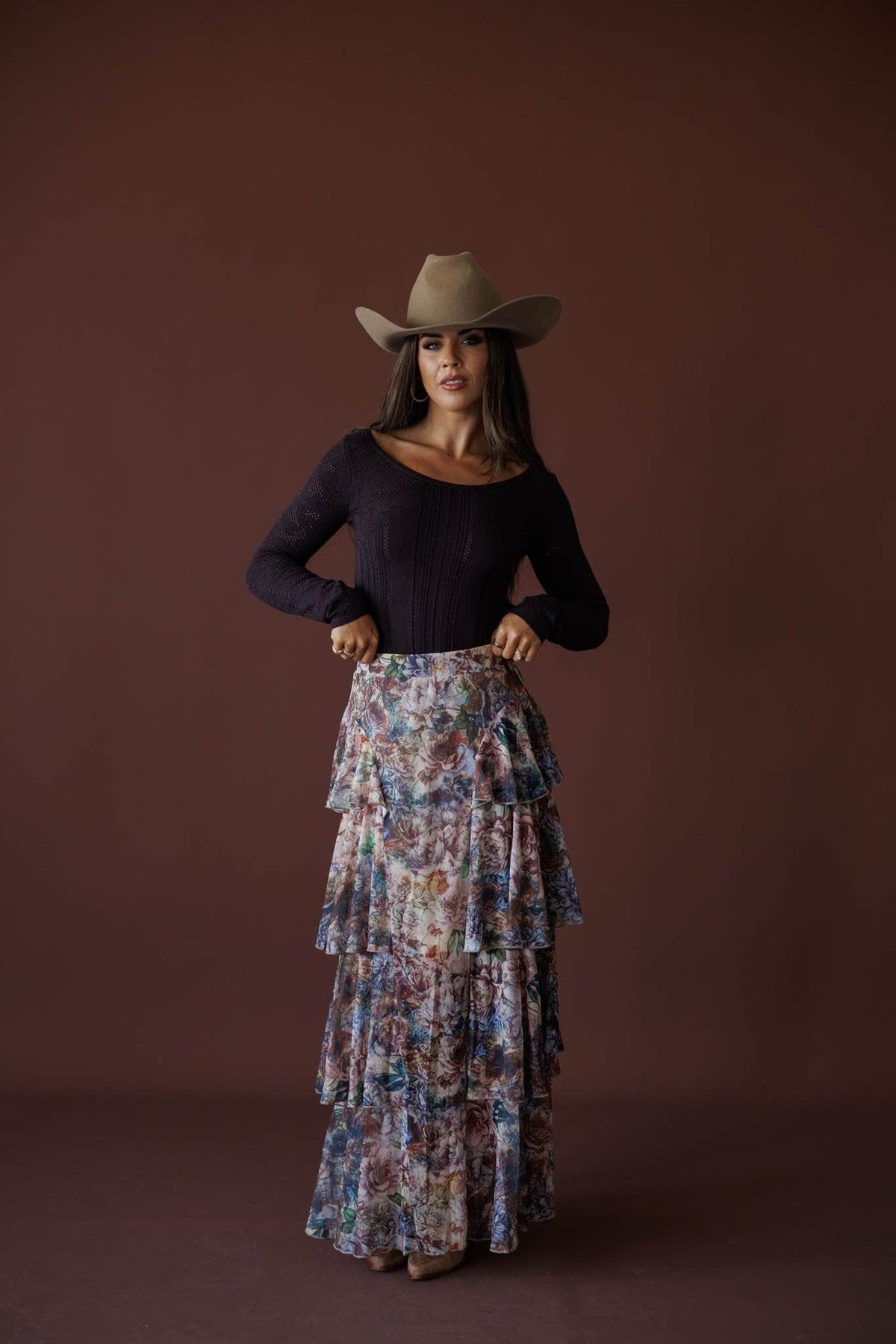Falling Fast Floral Skirt in sand floral, full-length view on model with a tan cowboy hat