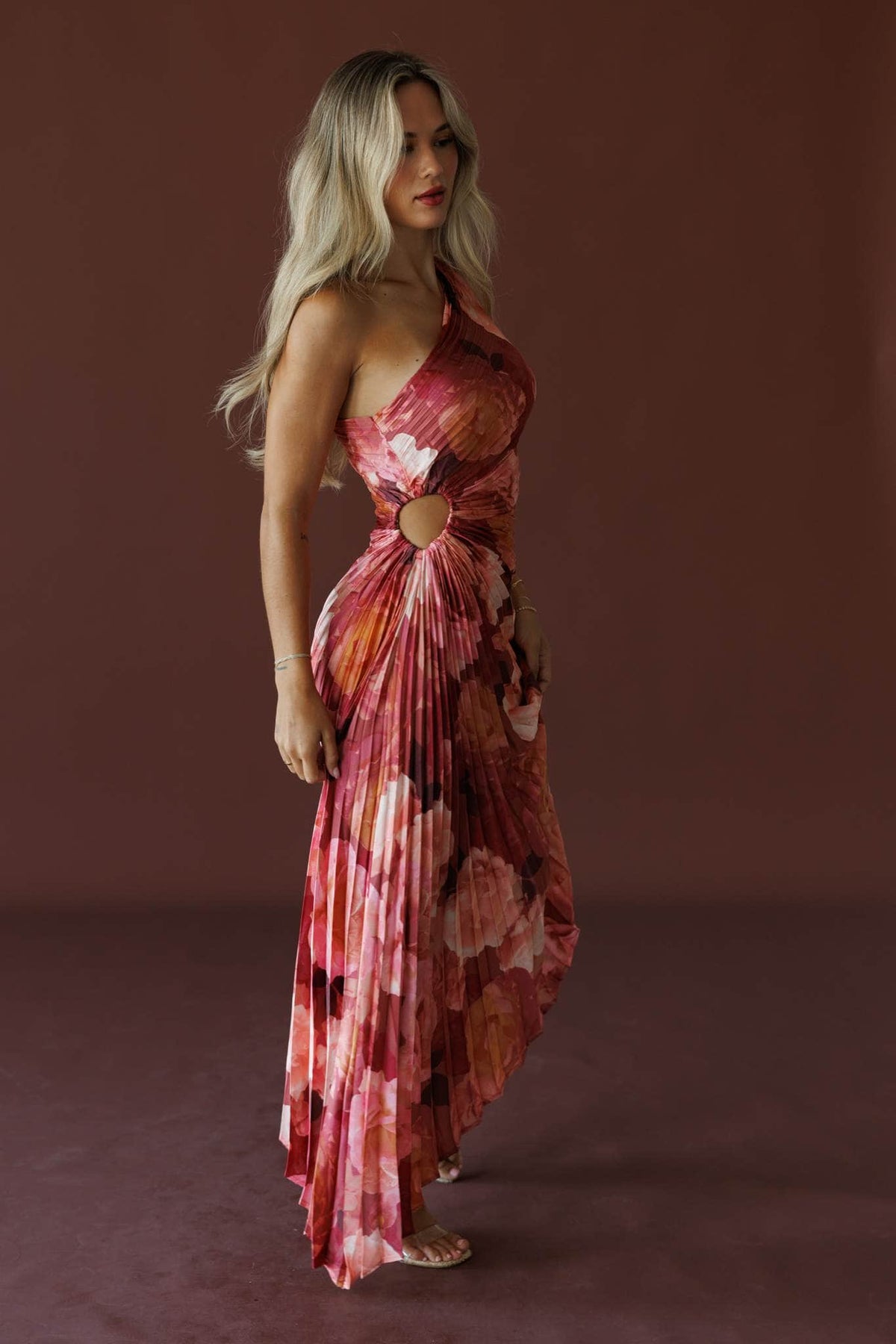Petal Effect Maxi Dress in romantic floral, side view showing the cut out waist
