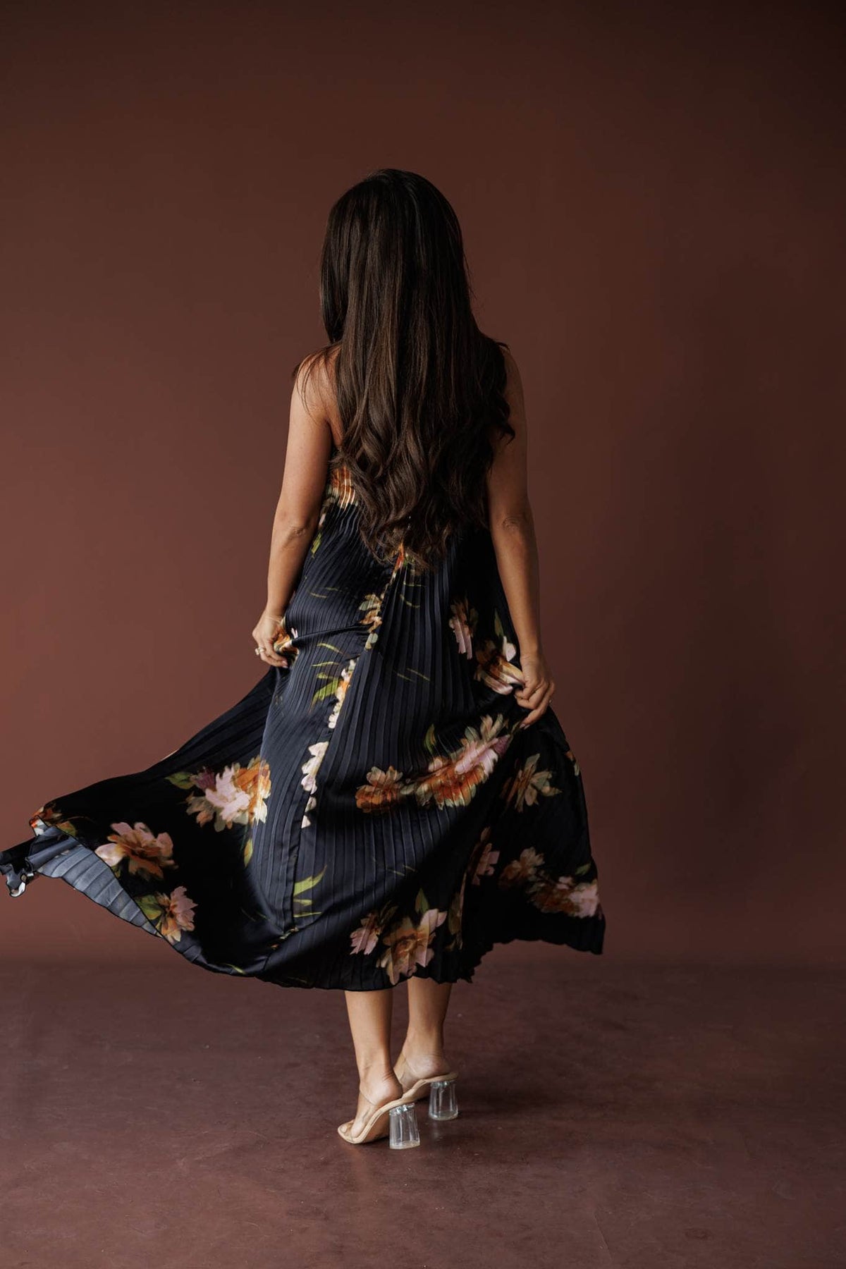 Nightfall Pleated Maxi Dress, in nightfall bloom, back view with the skirt in motion