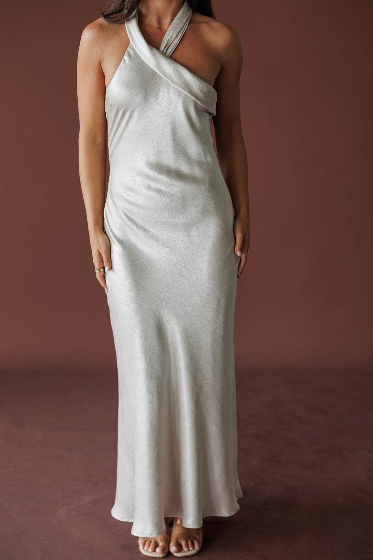 Moonlight Satin Halter Maxi, in silverlight, close front view of the halter neck and bias skirt