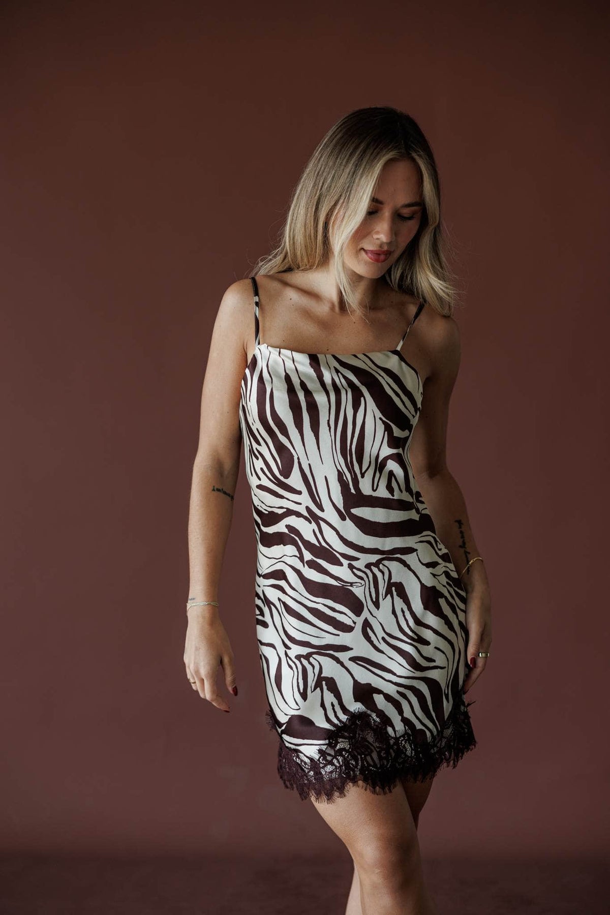 Serengeti Satin Slip Mini, in brown and ecru, three-quarter front view of the zebra print