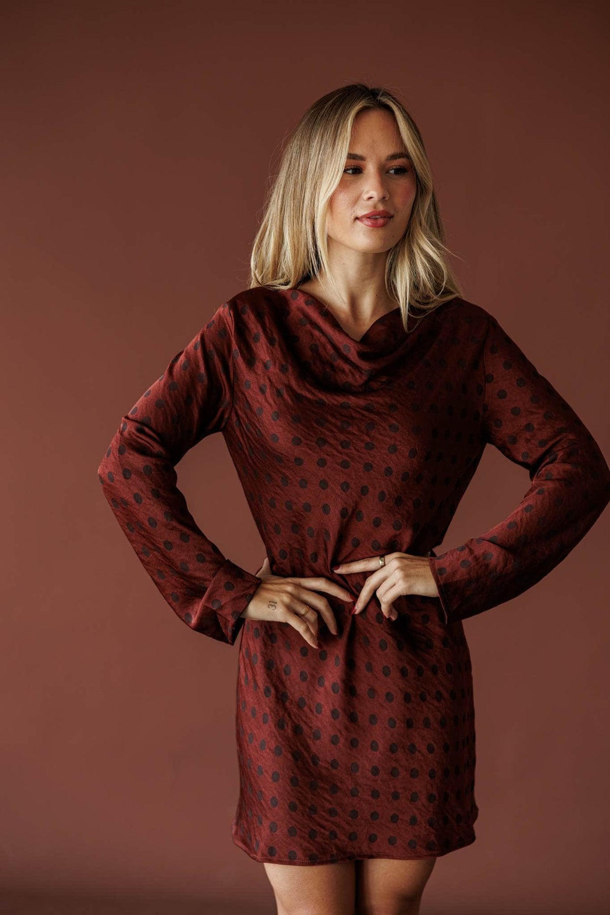 Claret Cowl Mini Dress, in maroon, front view of the cowl neckline and dot texture