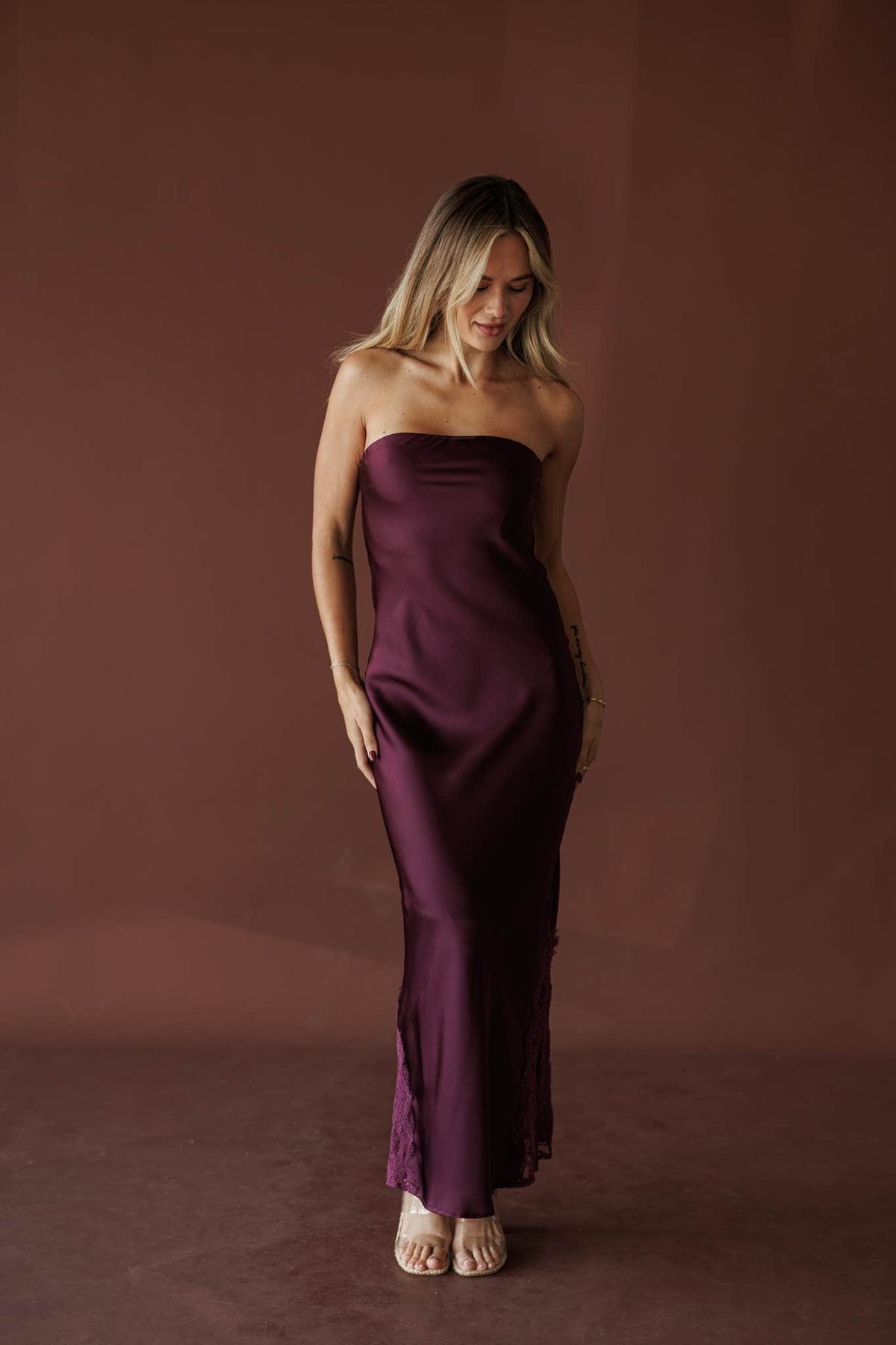 Aubergine Strapless Maxi, in deep plum, full-length side view of the column skirt