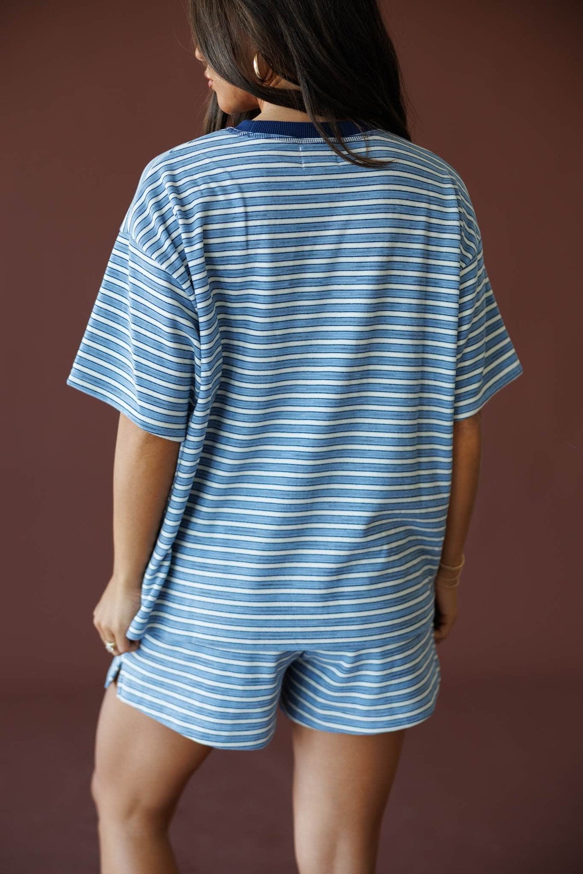 First Stop Oversized Fleece Tee in blue, back view showing the oversized striped fleece