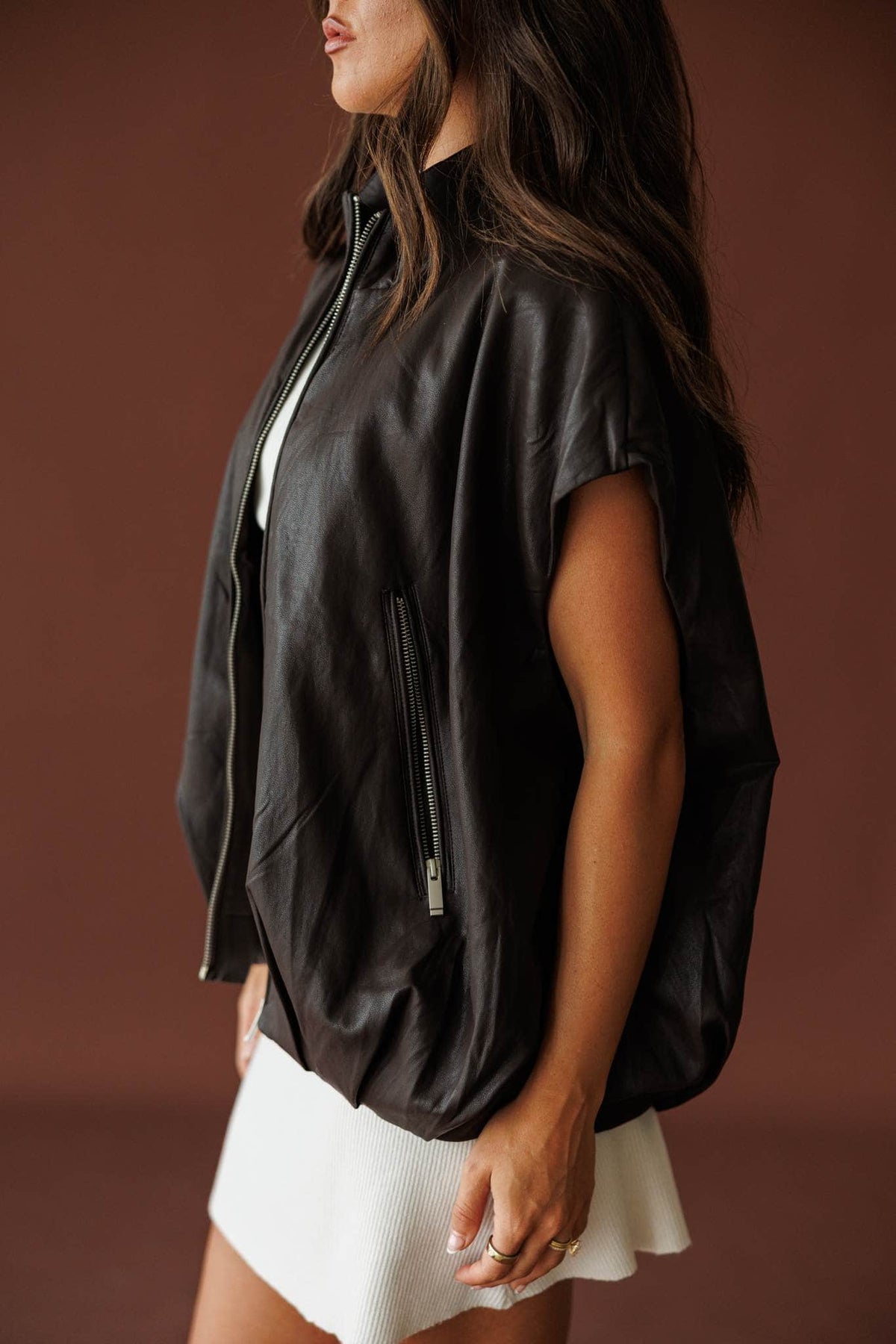 Stockyard Leather Vest in brown, side view of the relaxed boxy fit