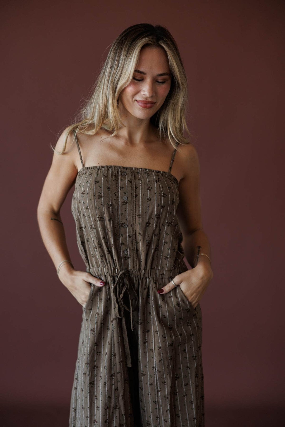 Garden Social Barrel Jumpsuit, in dark brown, three-quarter view with side pockets
