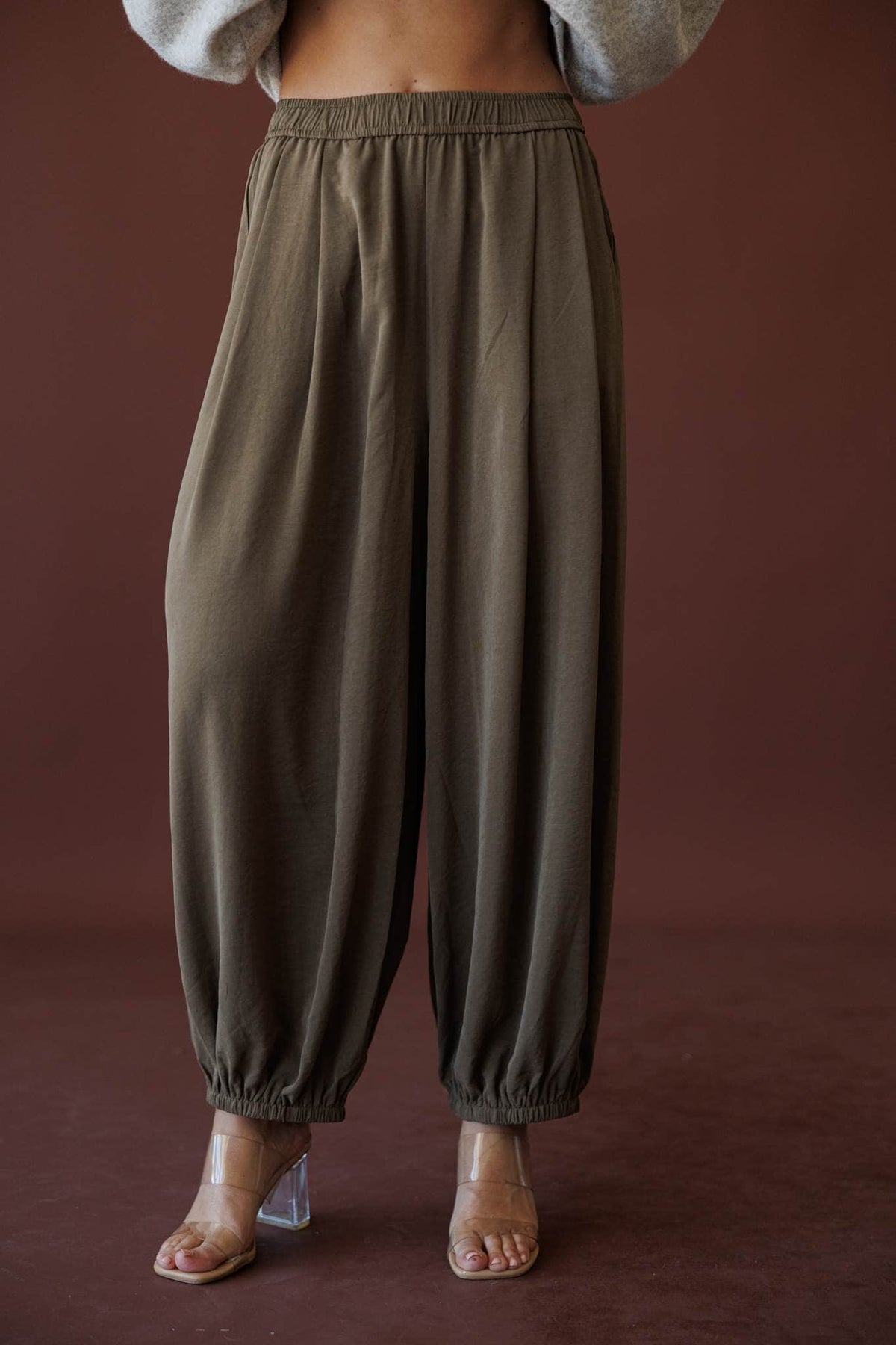 Olive Press Satin Pants, in khaki, front view of the satin wide leg pants