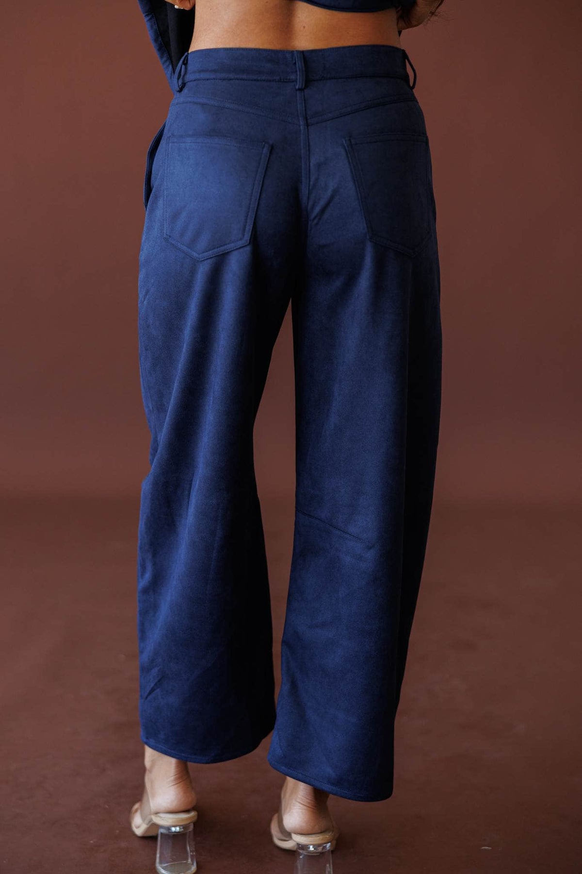 Suede Society Barrel Pants, in navy, back view of the suede pants