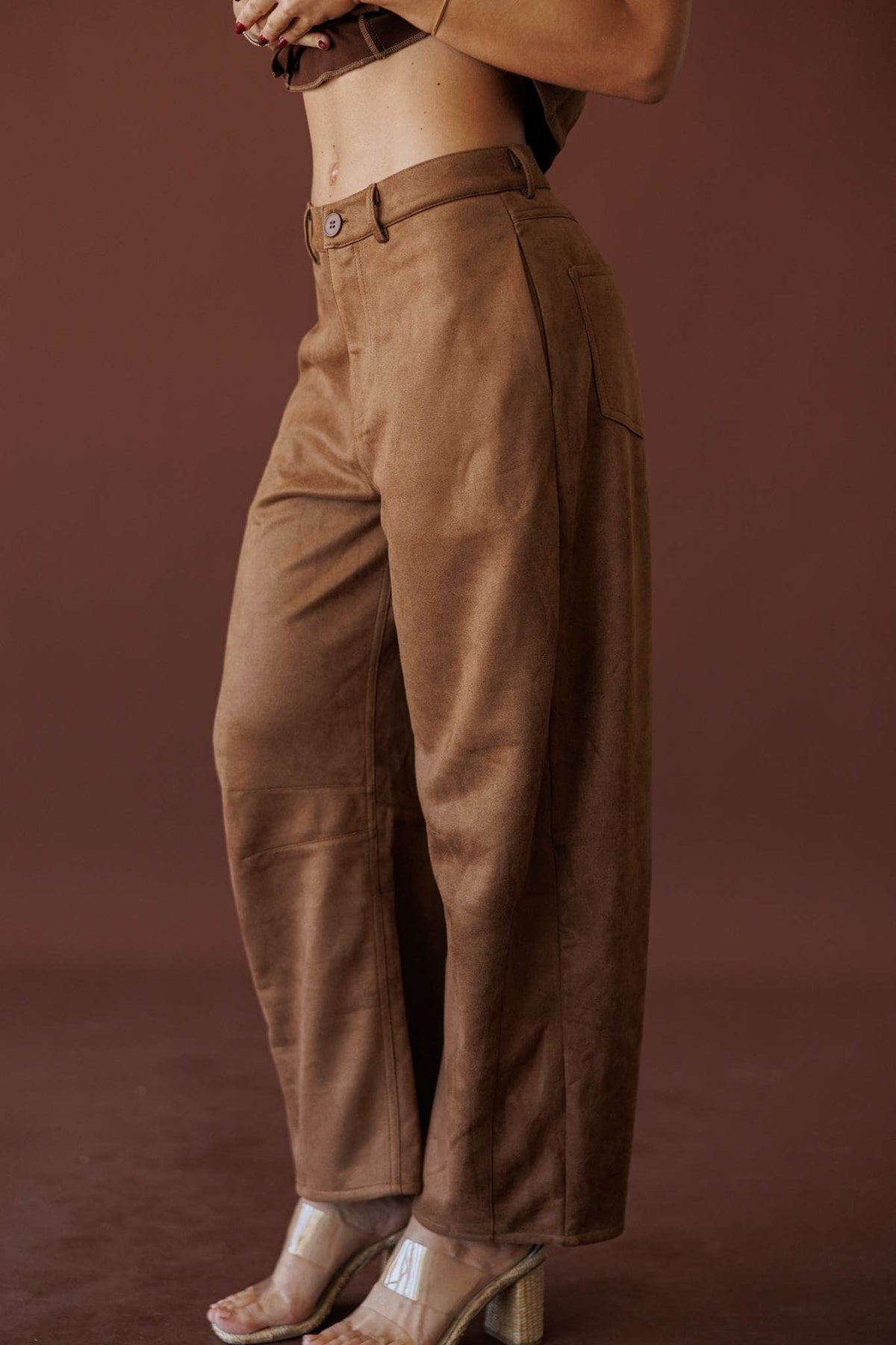 Suede Society Barrel Pants, in camel, side view of the curved barrel leg