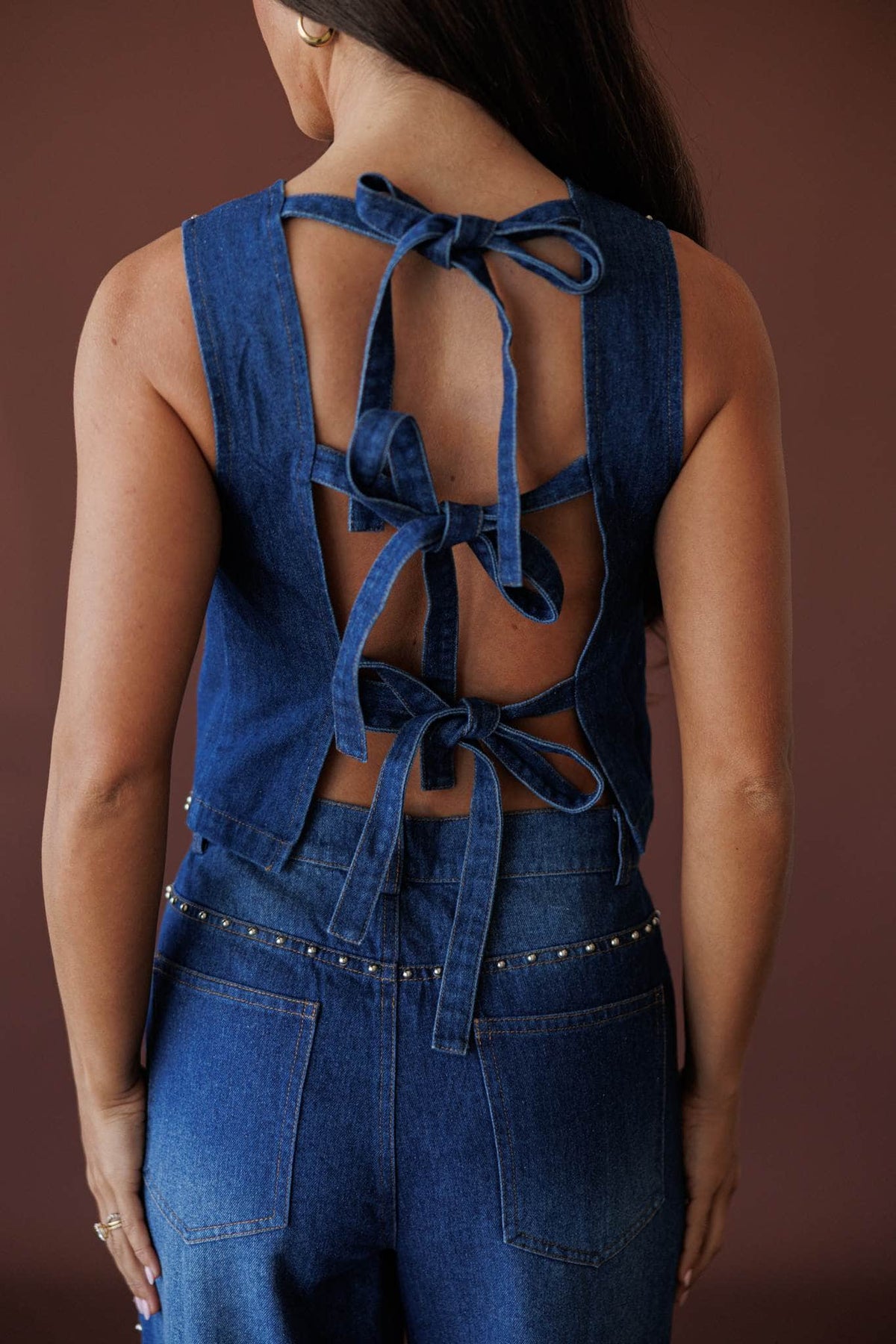 Studded Line Denim Vest, in denim, back view of the tie closure