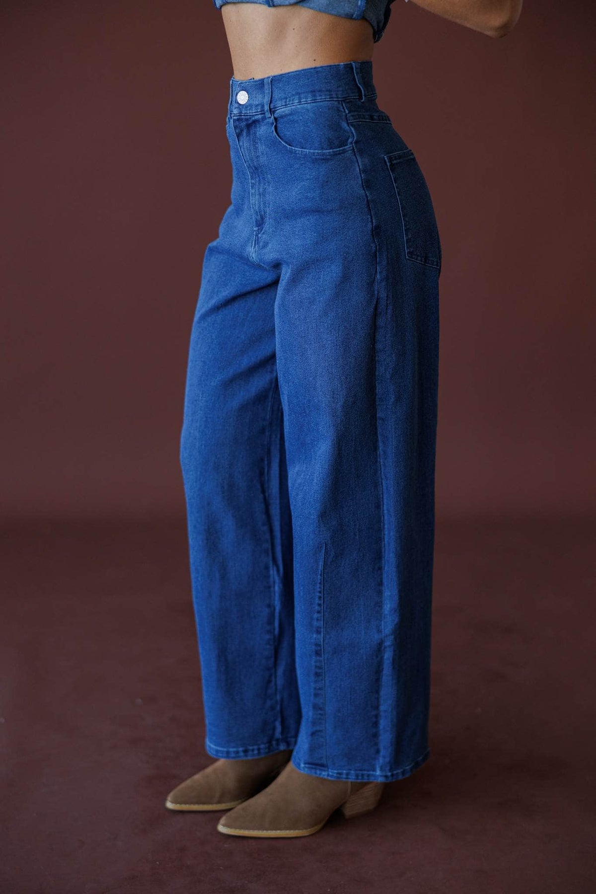 True Blue Barrel Jeans, in dark denim, side view of the tapered ankle