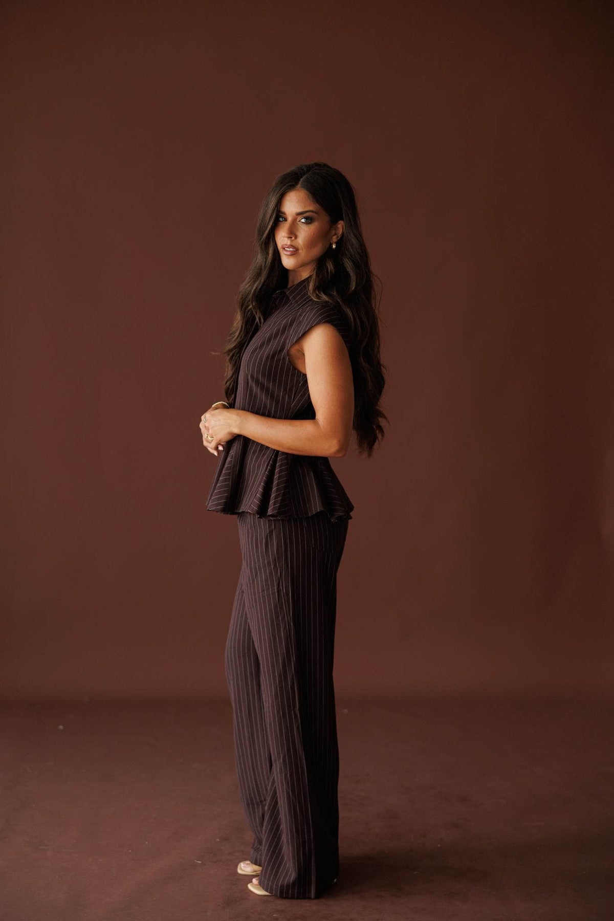 Members Only Pants in brown pinstripe, side view with the matching top
