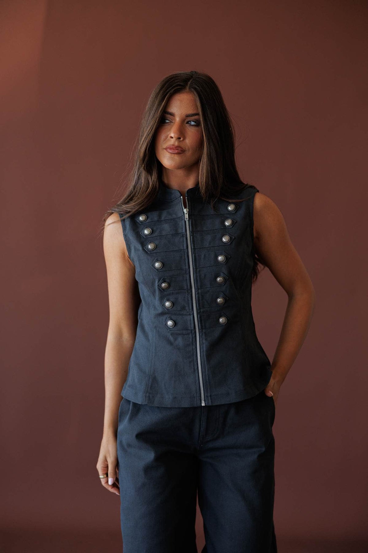 The Regent Vest, in navy, front view of the military button vest