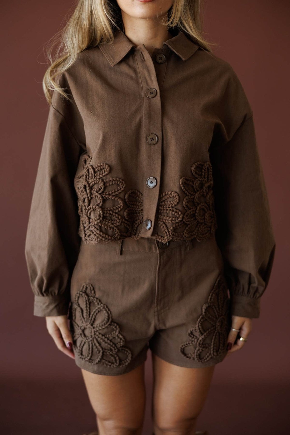 Wildflower Utility Jacket, in brown, close front view of the button placket
