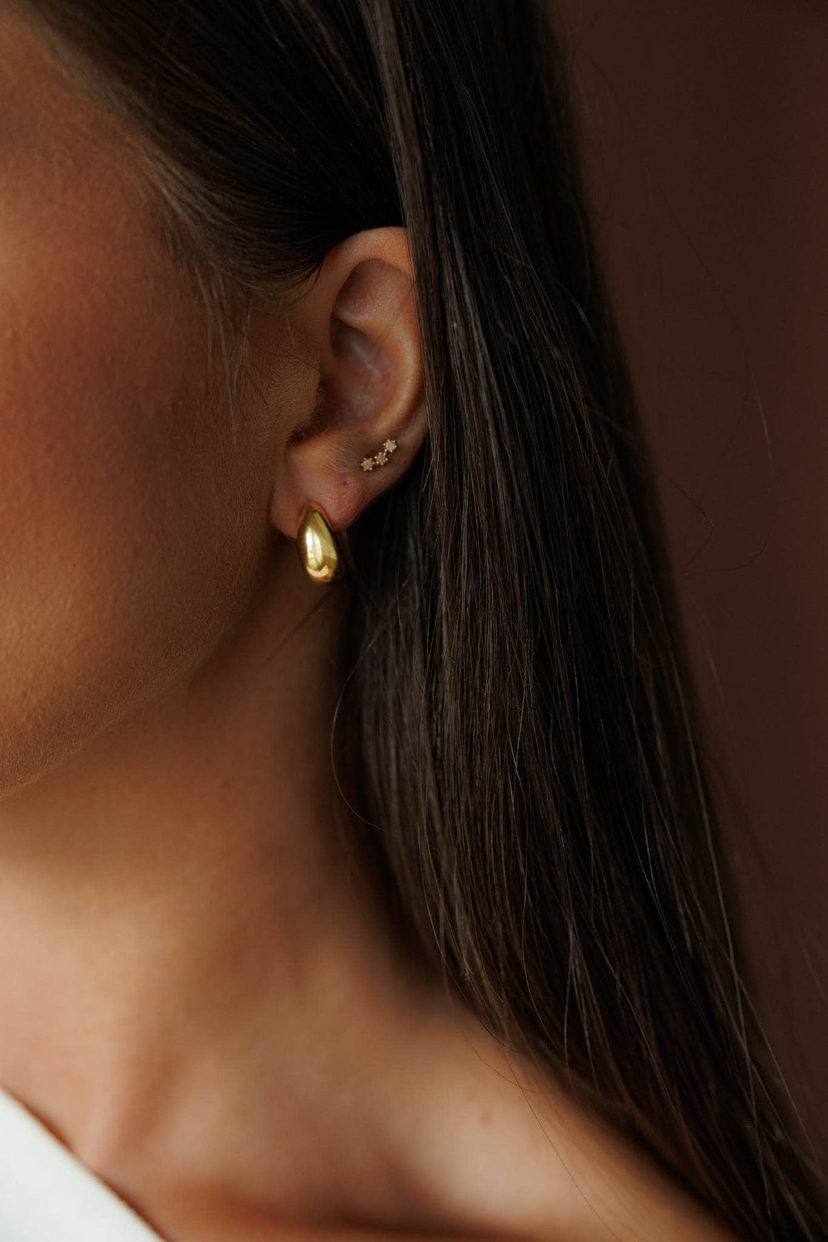 Halo Hoop Earrings, worn on the ear
