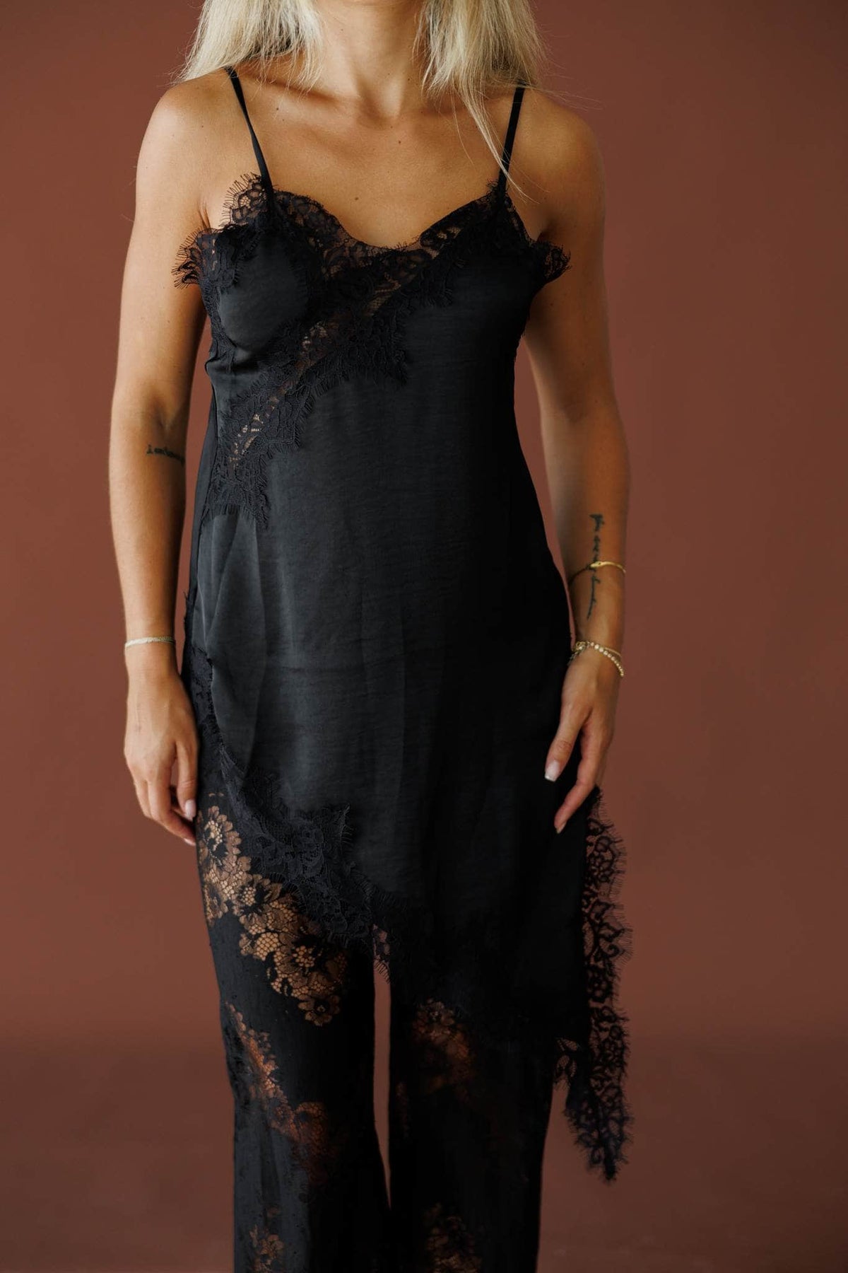Love Letters Lace Top in black, front close-up of the lace trimmed neckline