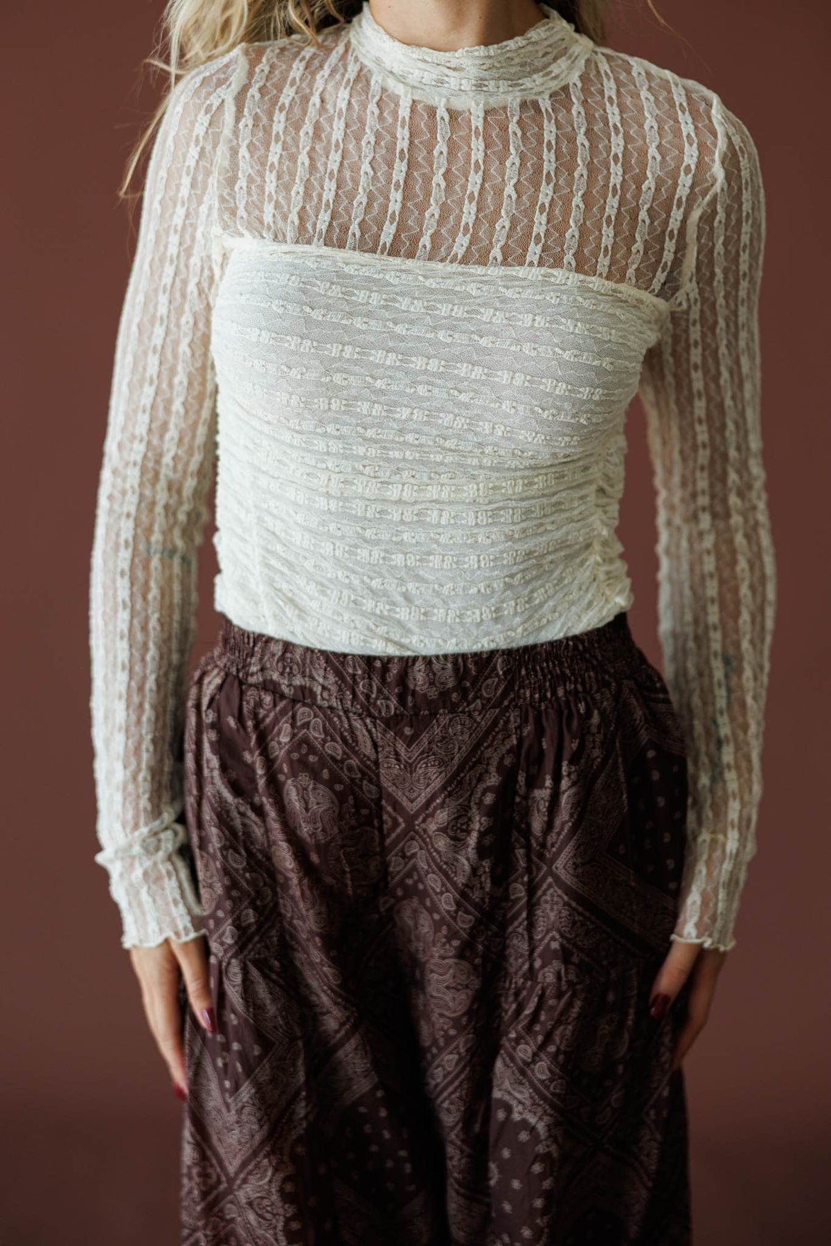 Lover In Lace Bodysuit in cream, front close-up of the sheer lace and mock neck