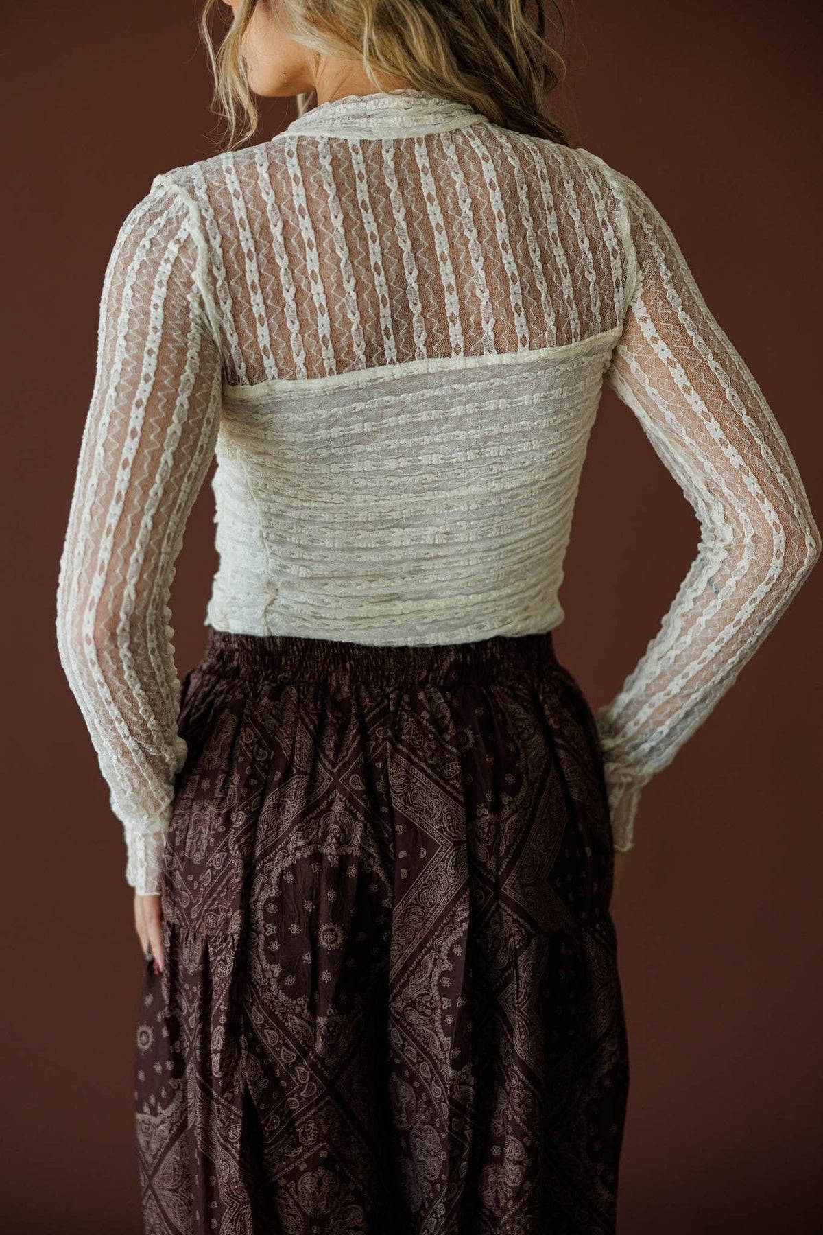 Lover In Lace Bodysuit in cream, back view showing the sheer lace back