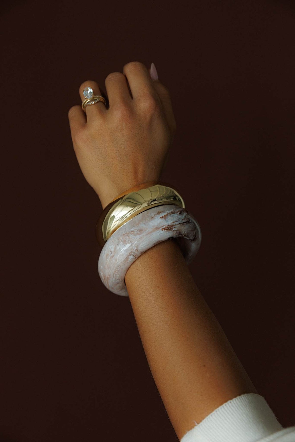 Marbled Stone Bangle Set, worn stacked on the wrist