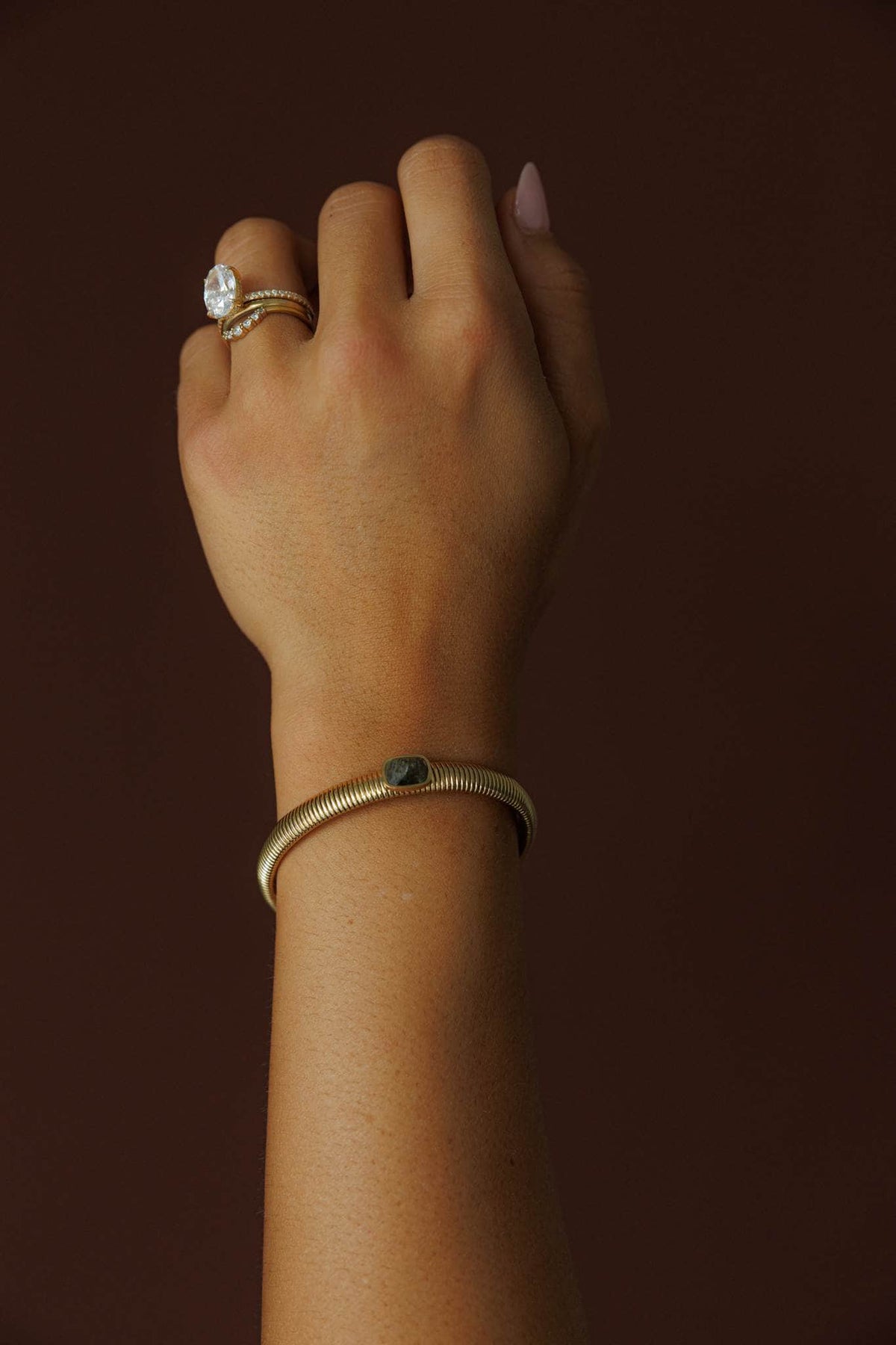 Gem Accent Bangle, close view of the polished stone accent