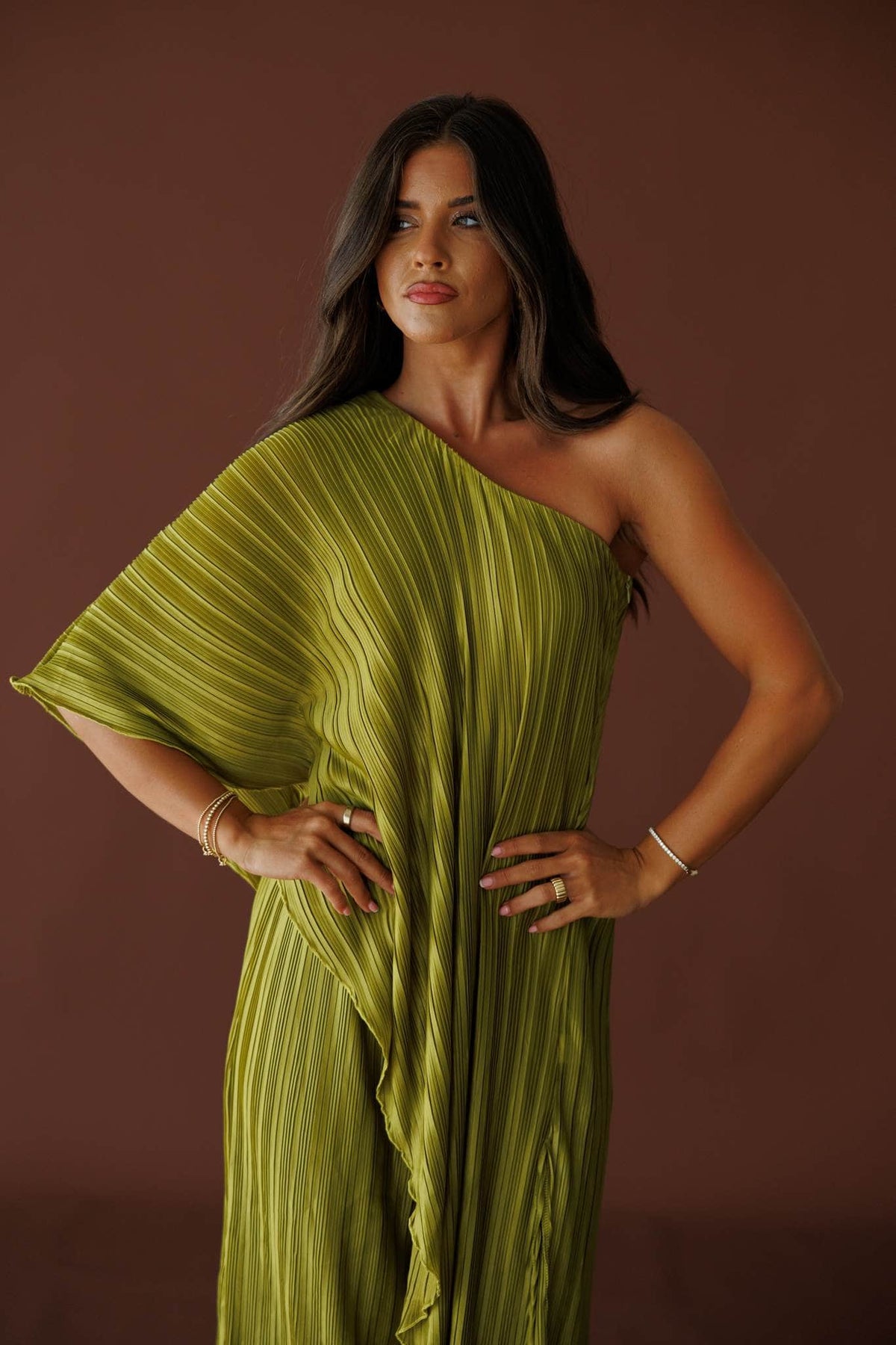Muse Moments Pleated Top in olive, front close-up of the one shoulder draped cape