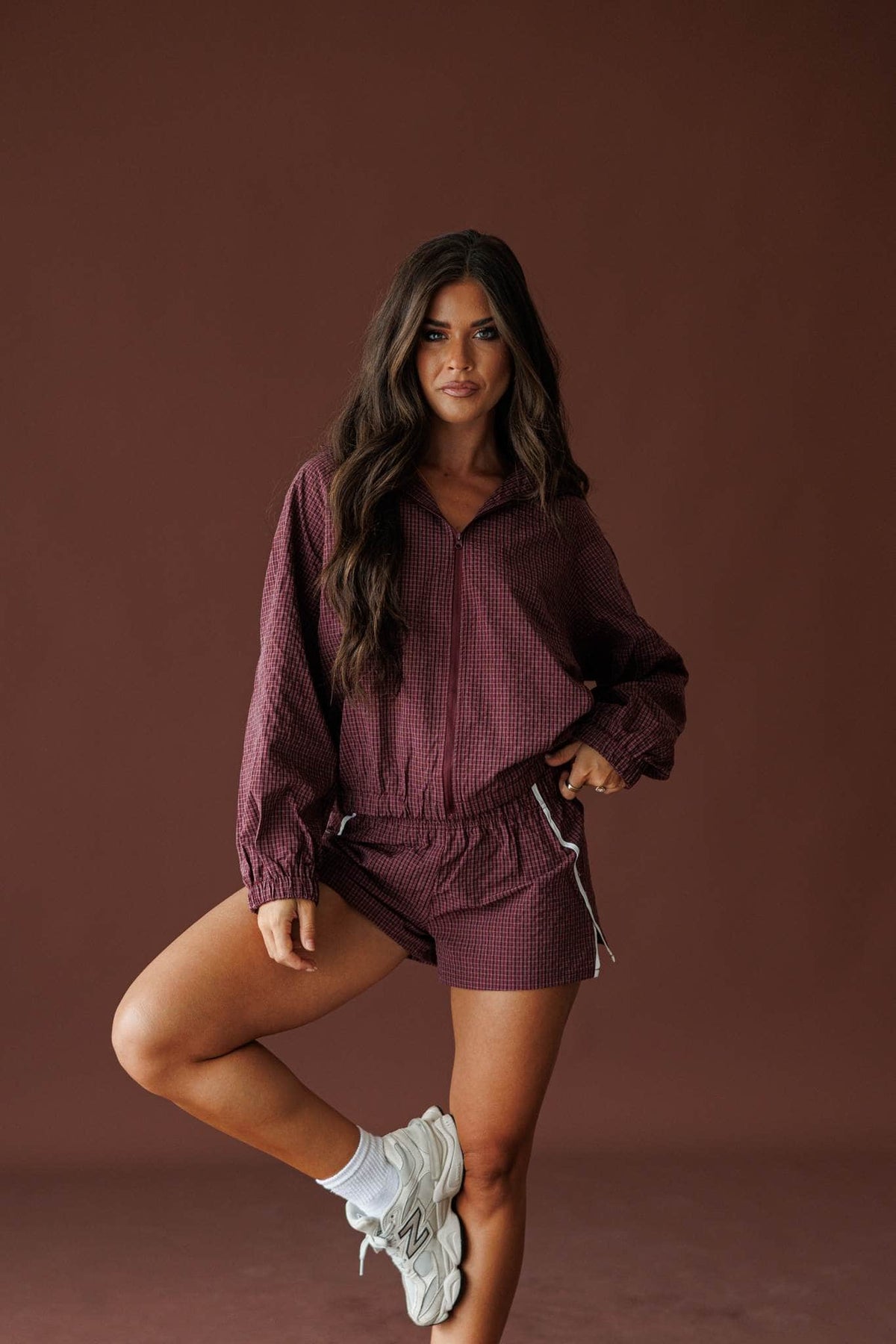 Off Duty Hooded Jacket in burgundy, full-length view with the matching track shorts