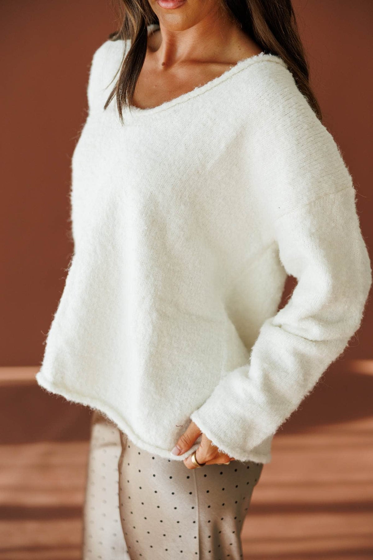 Half Past Cozy Sweater in ivory, side view showing the drop shoulder and fuzzy knit