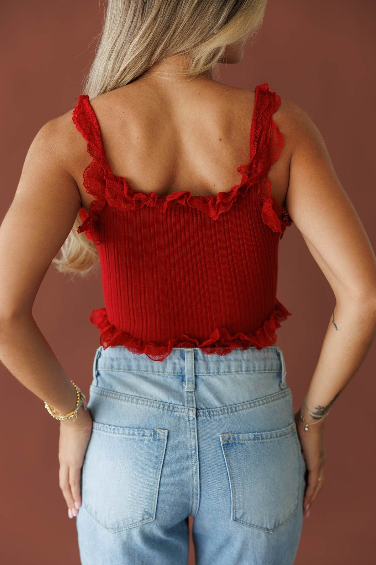 Pretty Little Secret Top in pomegranate, back view showing the ribbed knit and straps