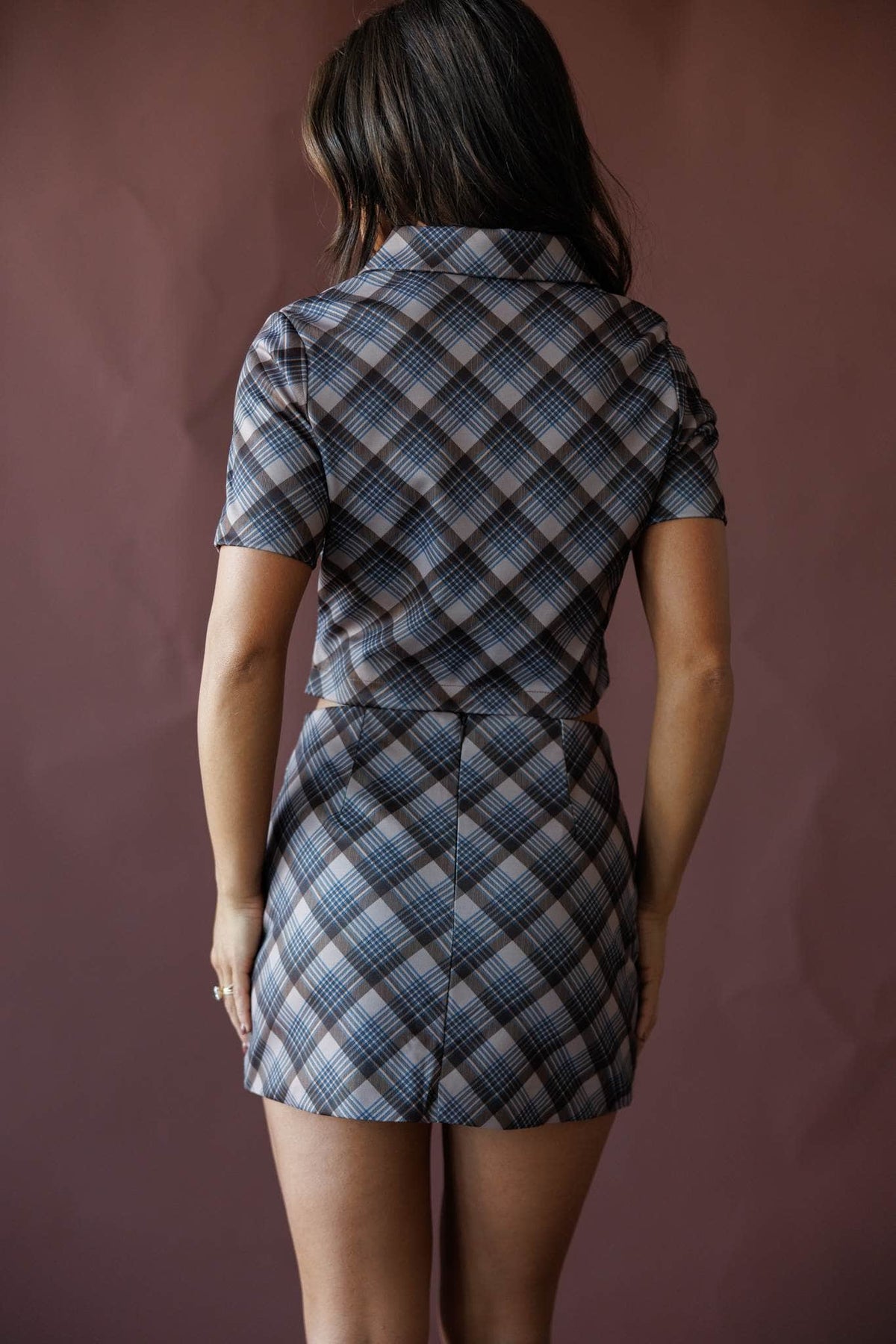 Grey and blue plaid zip front top