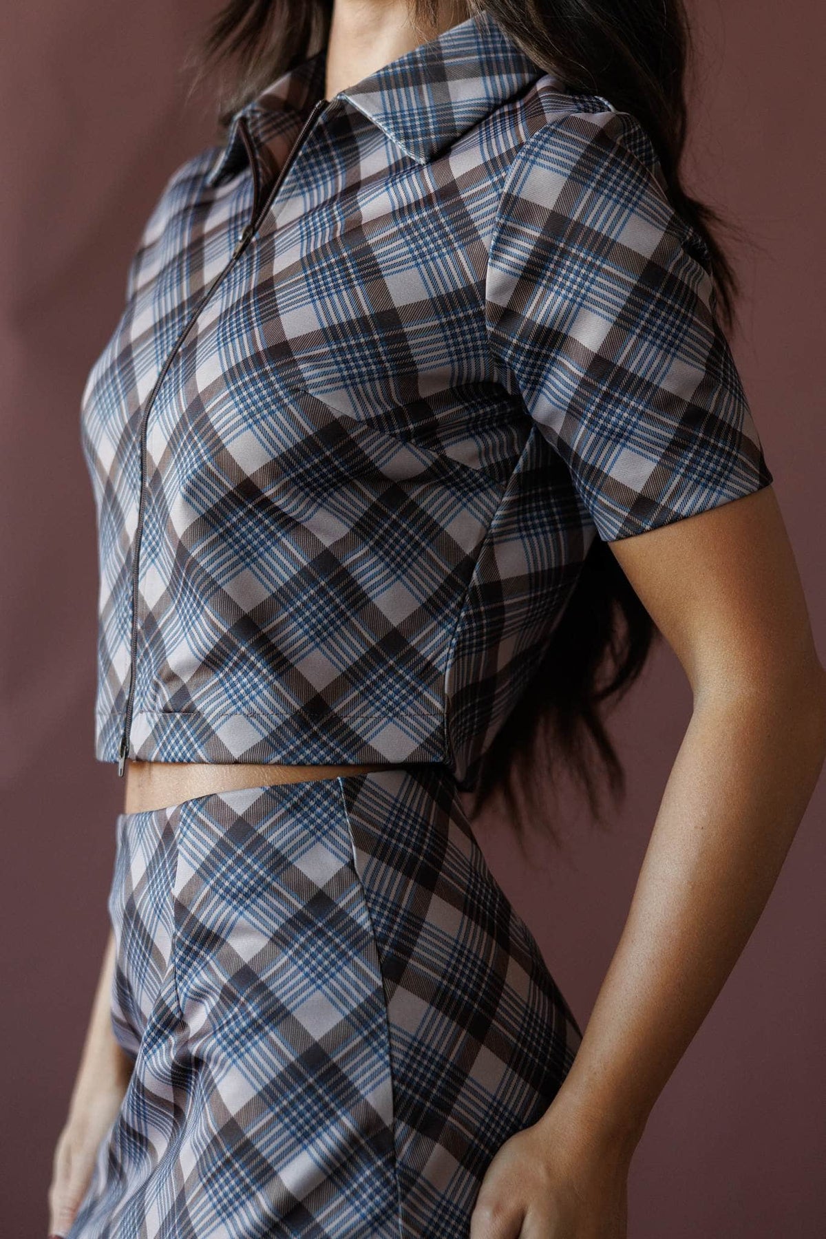 Grey and blue plaid zip front top