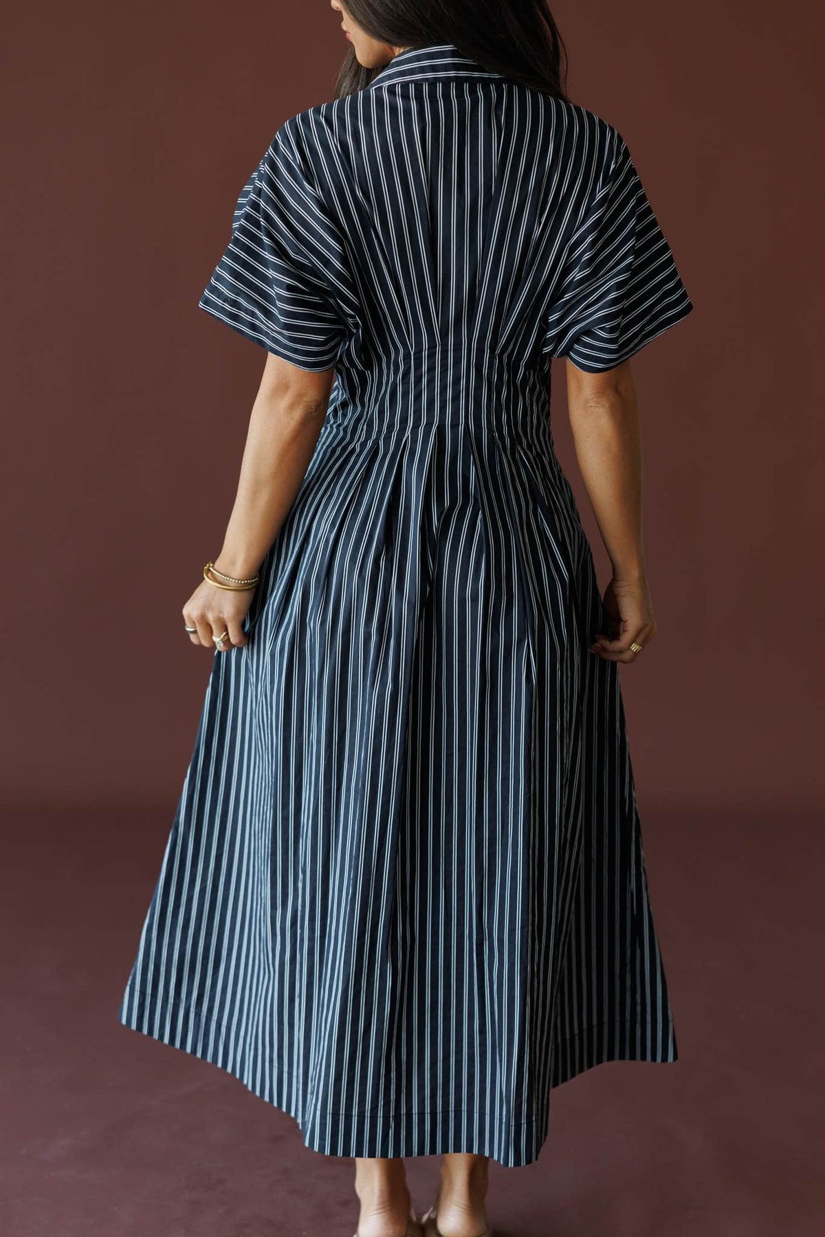 Striped Dolman Sleeve Midi Dress in black stripe, back view showing the shirred waist