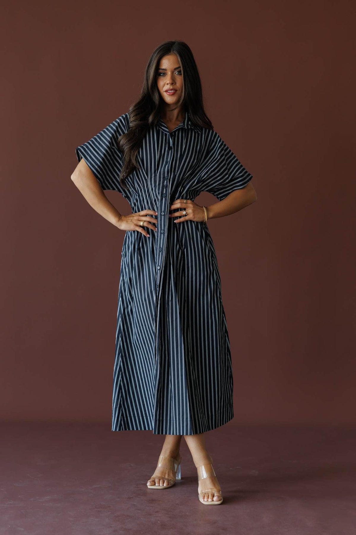 Striped Dolman Sleeve Midi Dress in black stripe, full-length view on model with hands on hips