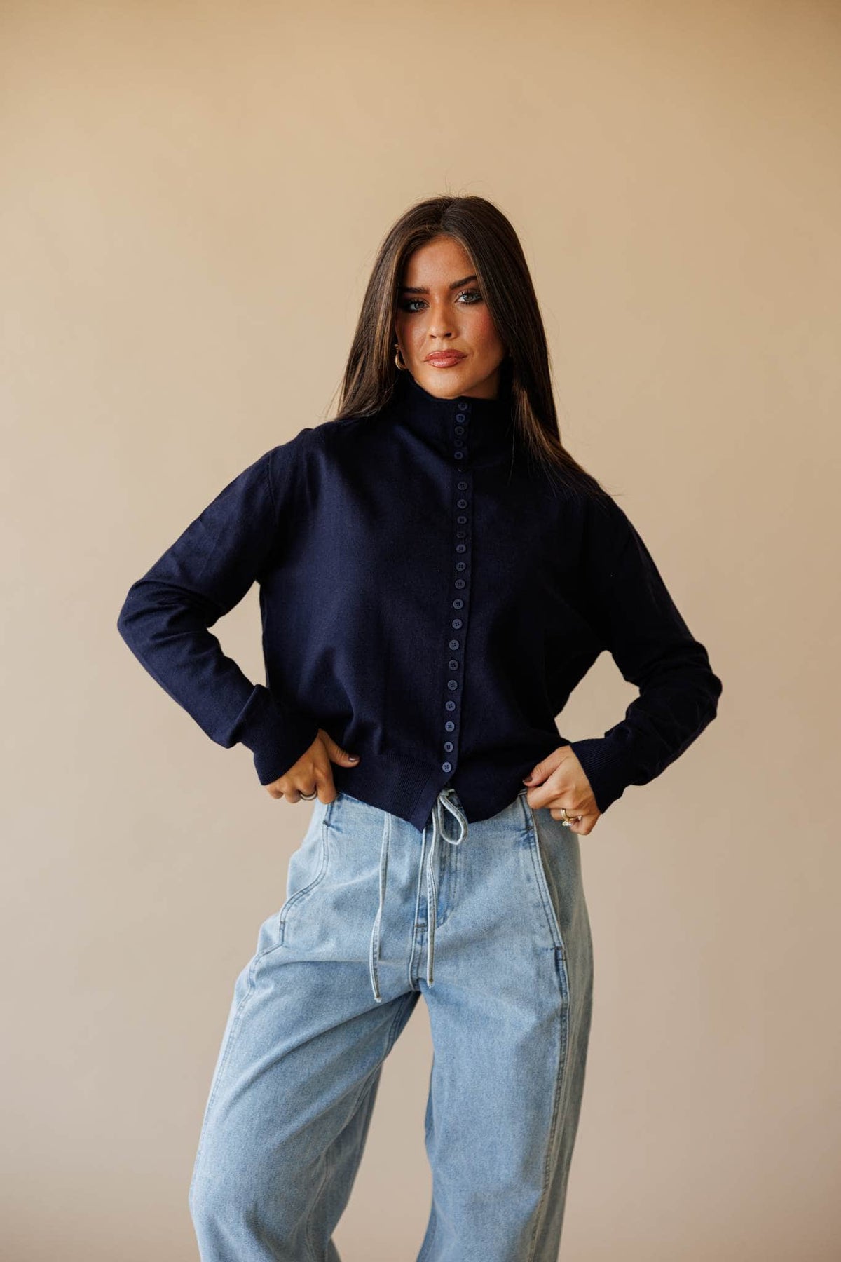 Navy button front mock neck cardigan, front view