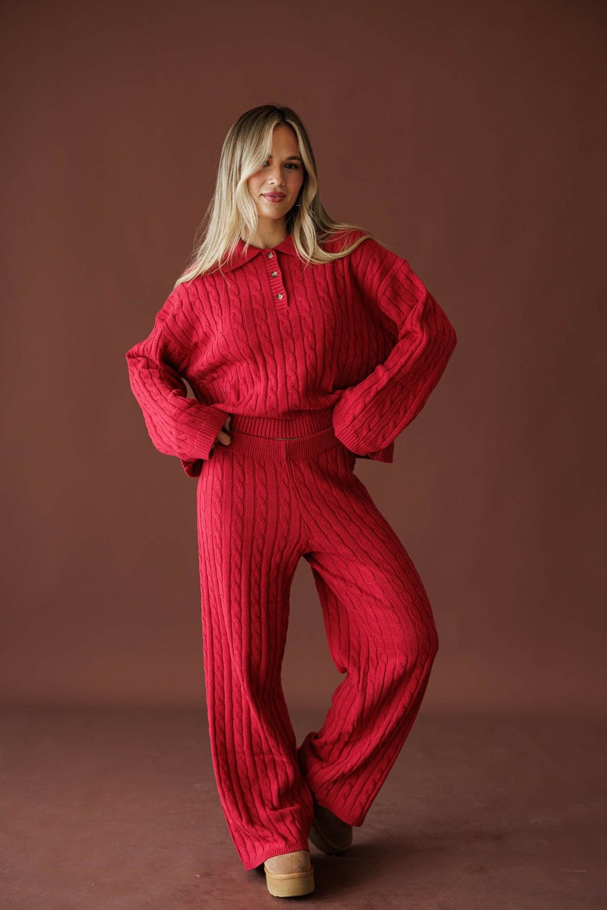 Cherry Cable Knit Pants in red, full-length view with the matching cable knit sweater