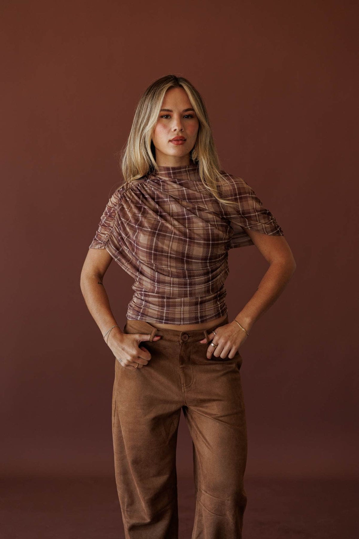 Autumn Static Plaid Top, full-length view with suede trousers
