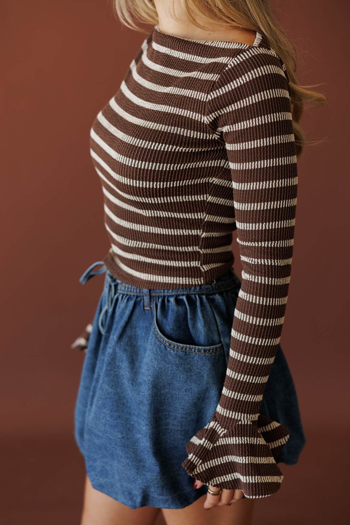 Coffee Stripe Long Sleeve Top, side view of the fitted knit