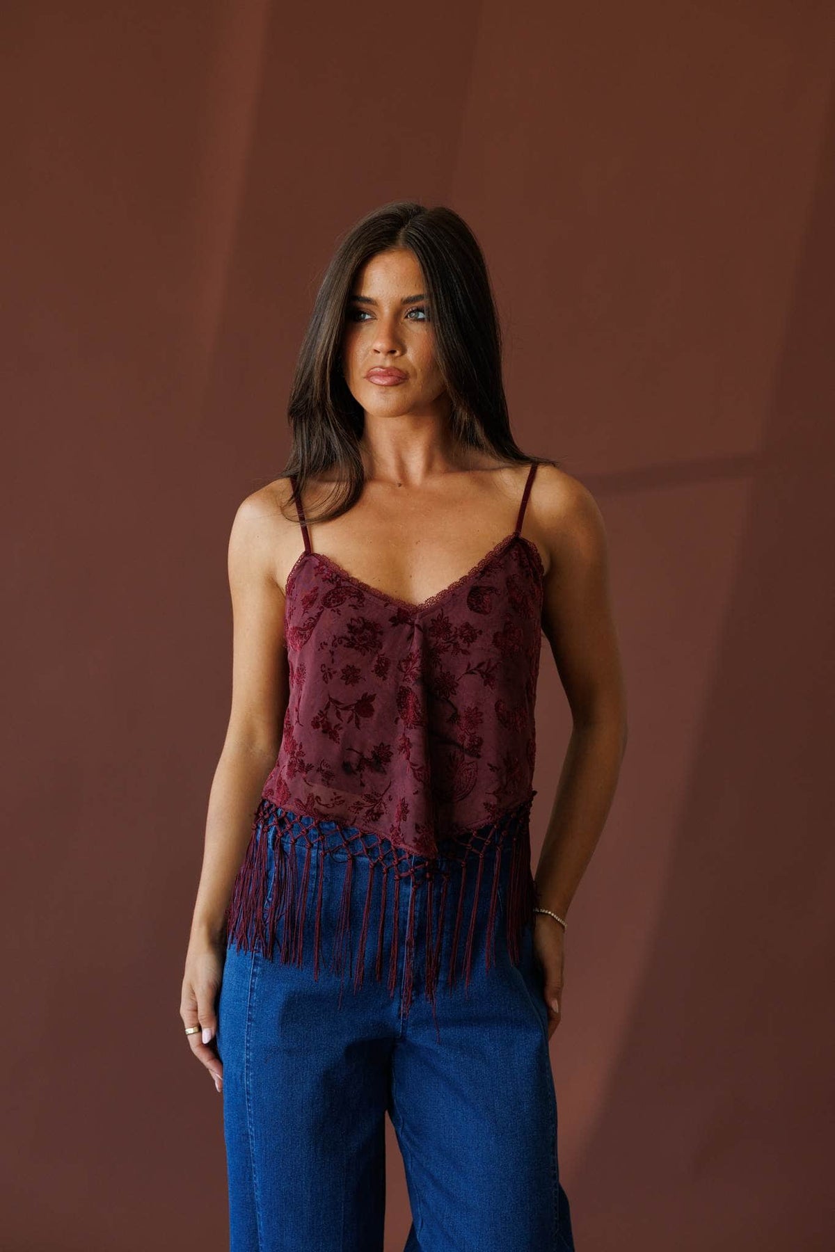 Burgundy fringe top, front view