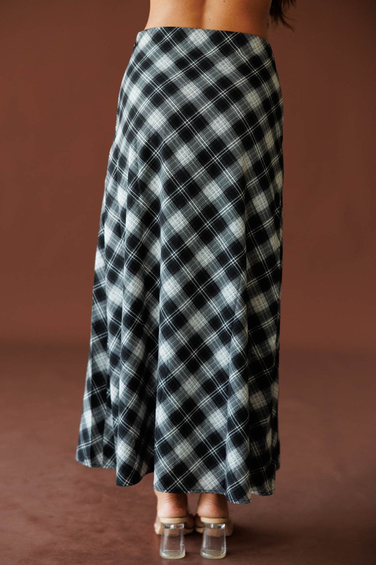 Town Square Plaid Skirt in black, front view showing the A-line maxi shape