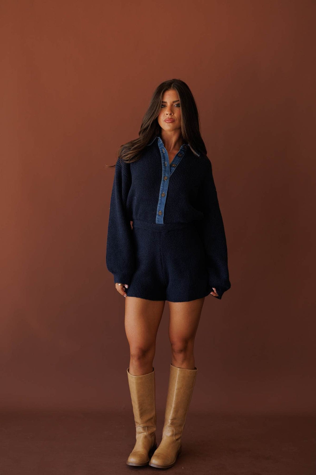 Mixed Signals Sweater Romper, in midnight, full-length view with tall boots