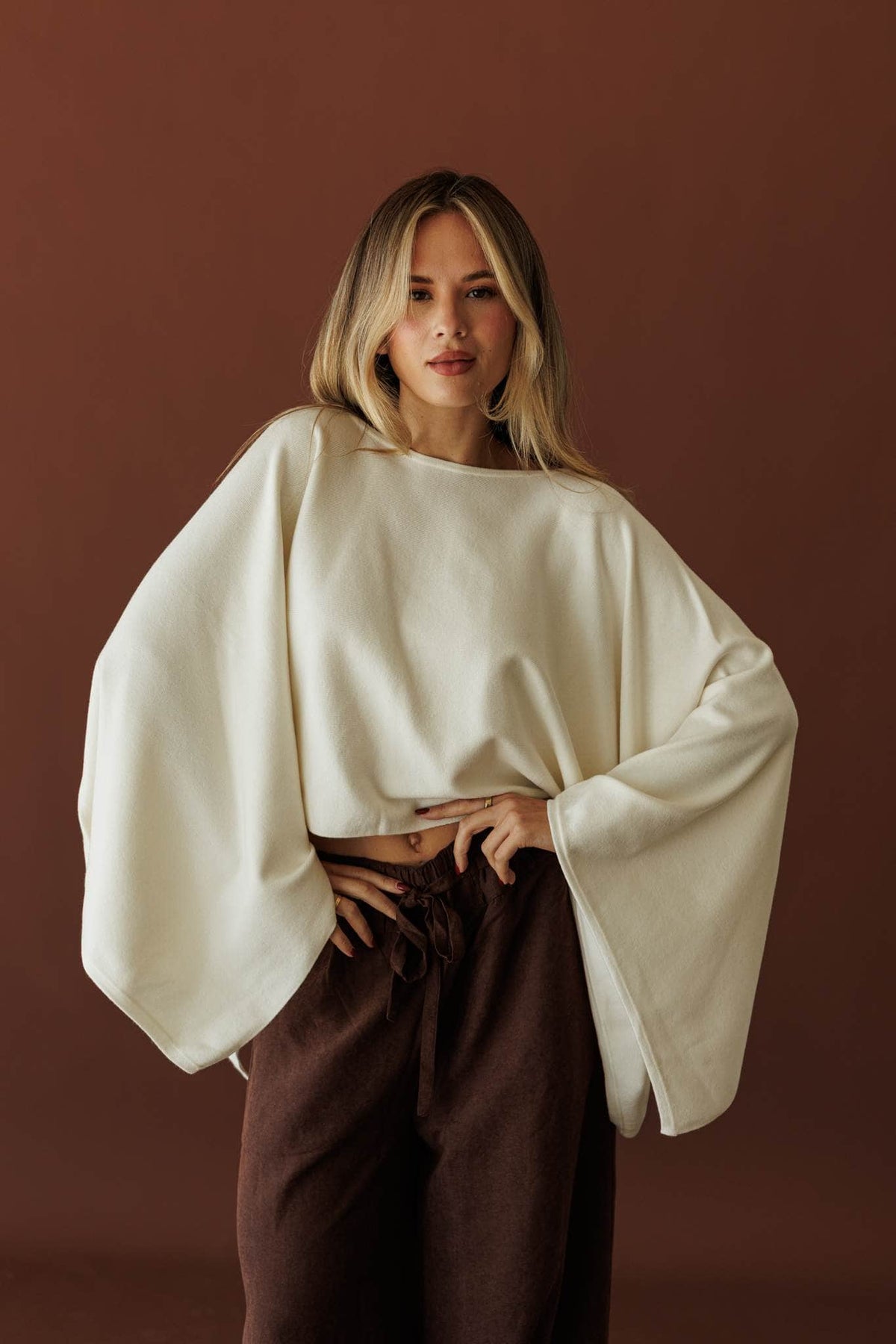 Wide Open Boat Neck Sweater, in cream, front view of the boat neck and dolman sleeves