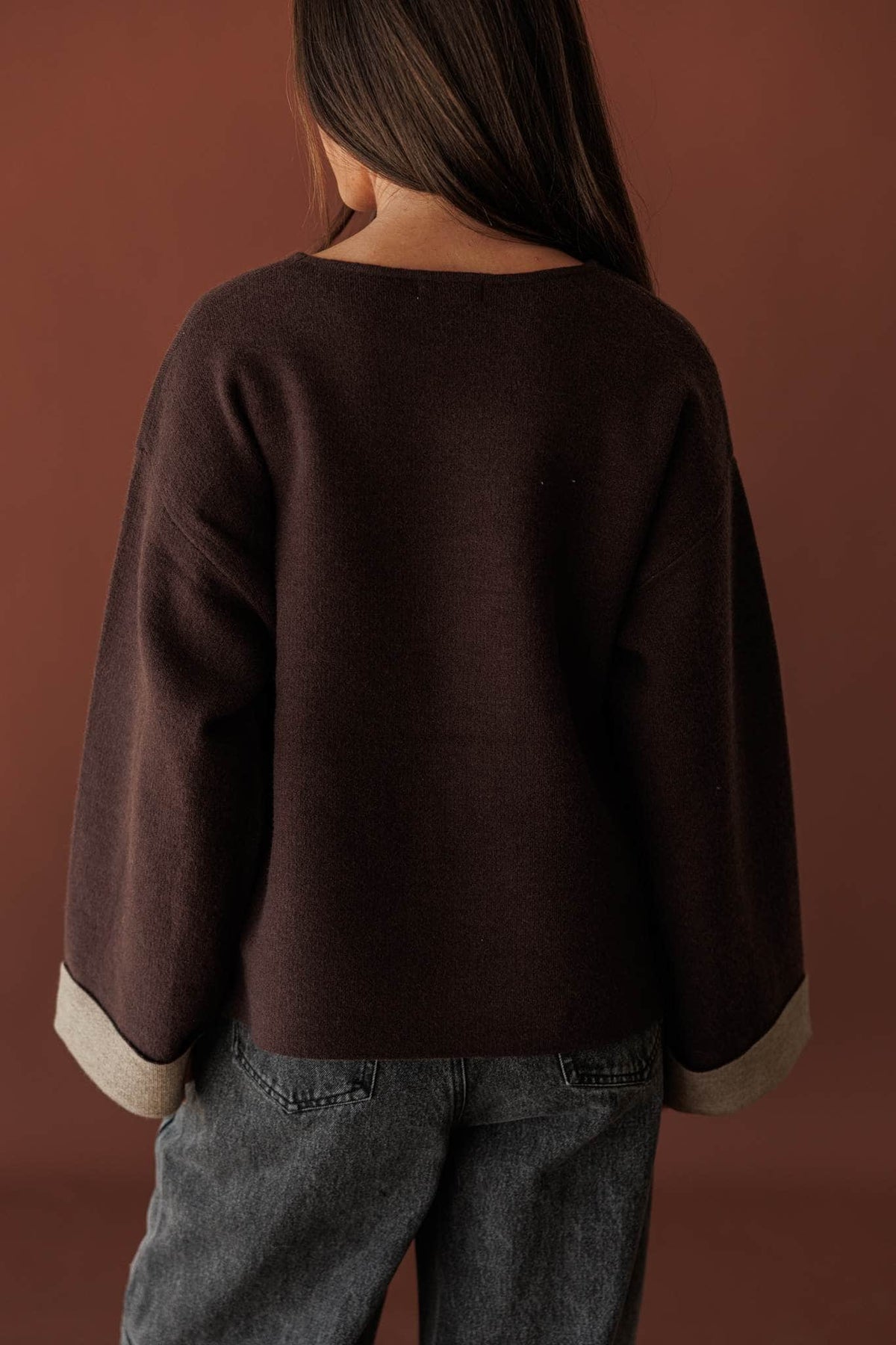 Cuffed In Contrast Sweater, back view of the dropped shoulder