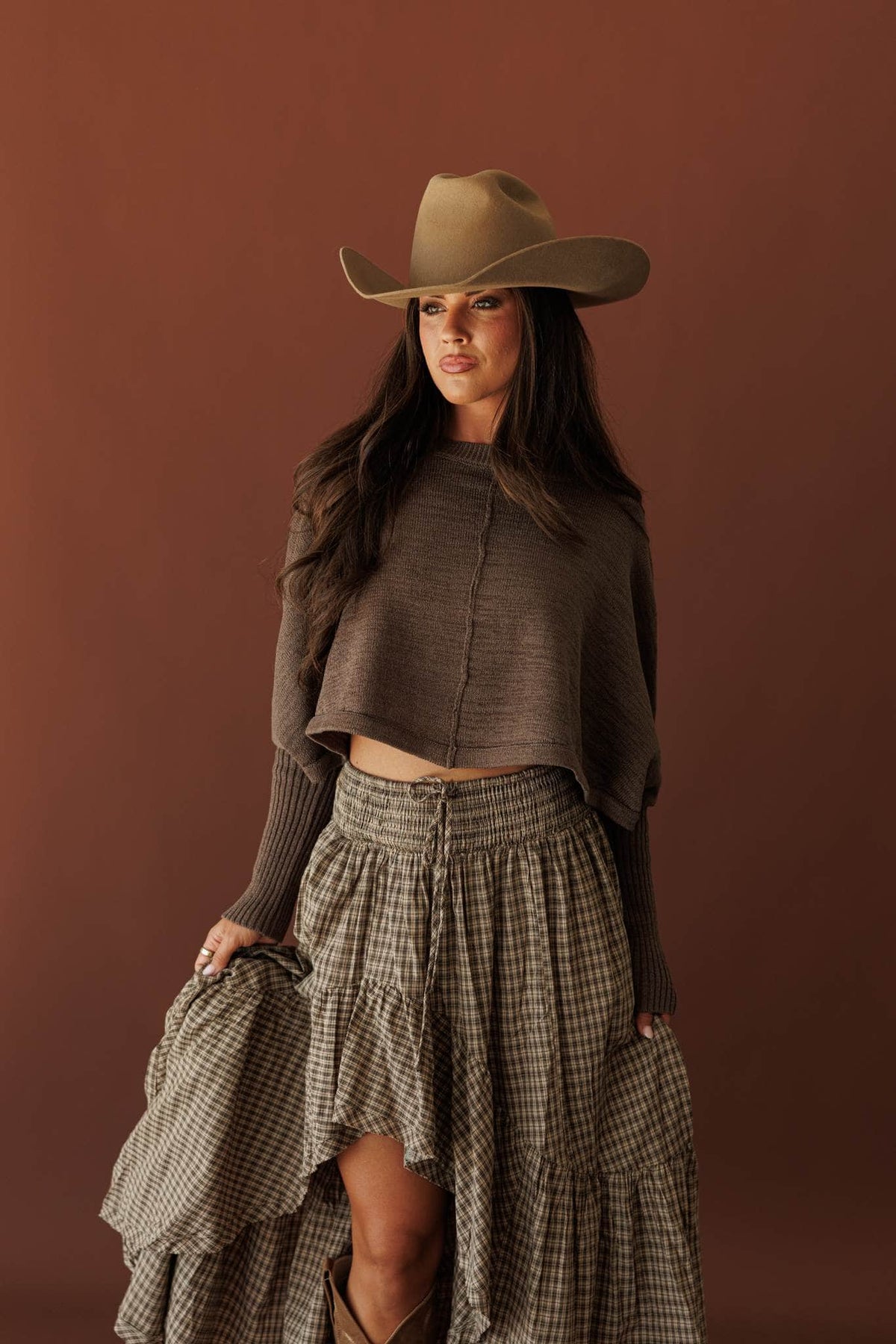 Quiet Morning Mock Neck Sweater, in stone, full-length view with a checked skirt and hat
